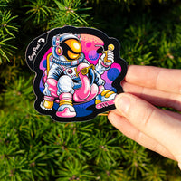 Custom cut sticker held in hand