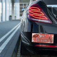 Bumper sticker on a car